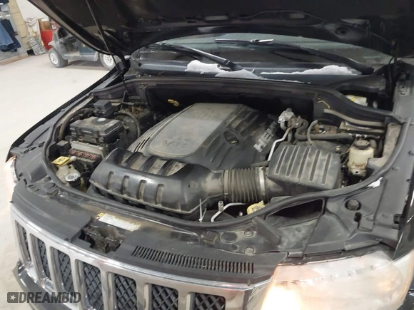 2011 Jeep Grand Cherokee Overland with VIN 1J4RR6GTXBC701186, listed as a IAAI auction lot 41553697 with 172,317 mi miles. Bid and sale history available at carsss.com. Image 10.