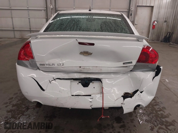 2012 Chevrolet Impala LTZ with VIN 2G1WC5E33C1331027, listed as a IAAI auction lot 42170924 with 211,065 mi miles and . Bid and sale history available at DreamBid. Image 6.