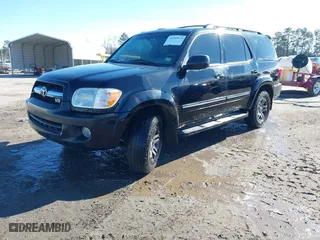 2006 Toyota Sequoia Limited with VIN 5TDBT48AX6S263316, listed as a IAAI auction lot 41559979 with 401,207 mi miles. Bid and sale history available at carsss.com. Image 2.