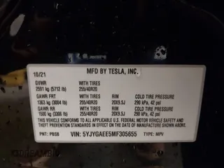 2021 Tesla Model Y Long Range with VIN 5YJYGAEE5MF305655, listed as a IAAI auction lot 41860993 with 50,750 mi miles. Bid and sale history available at carsss.com. Image 9.