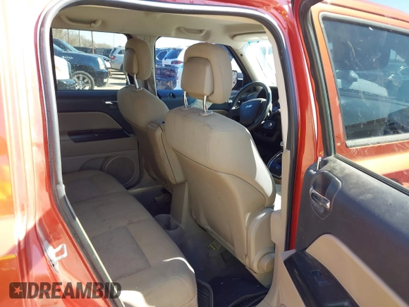 2010 Jeep Patriot Sport with VIN 1J4NT2GA3AD518535, listed as a IAAI auction lot 41638296 with 229,435 mi miles. Bid and sale history available at carsss.com. Image 8.