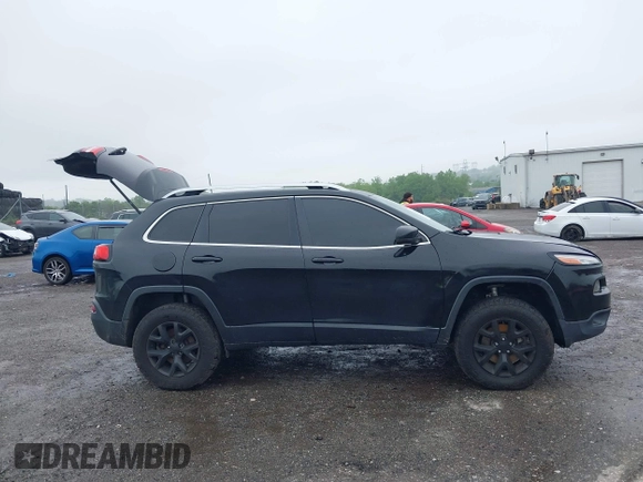 2017 Jeep Cherokee Limited with VIN 1C4PJMDB7HW599633, listed as a IAAI auction lot 42276581 with 169,865 mi miles and . Bid and sale history available at DreamBid. Image 14.