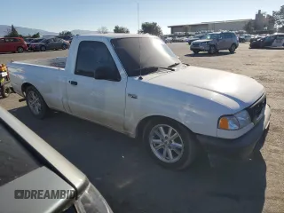 2002 Mazda B-Series 2WD Truck SX with VIN 4F4YR12D62TM15685, listed as a Copart auction lot 88994055 with 143,595 mi miles and Salvage Title. Bid and sale history available at carsss.com. Image 4.
