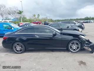 2017 Mercedes-Benz E-Class E 400 with VIN WDDKJ6HBXHF353634, listed as a IAAI auction lot 41203314 with 106,531 mi miles. Bid and sale history available at carsss.com. Image 14.