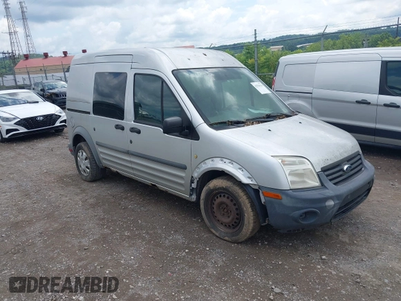 2012 Ford Transit Connect XL z VIN NM0LS6AN1CT122872, wystawiony jako IAAI lot #42525116 z przebiegiem 295 458 mil mil oraz . Historia ofert i sprzedaży dostępna na DreamBid. Obrazek 1.
