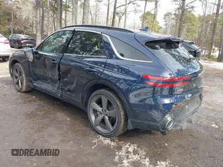 2022 Genesis GV70 Sport z VIN KMUMCDTC3NU074029, wystawiony jako IAAI lot #41400987 z przebiegiem 29 494 mil mil oraz . Historia ofert i sprzedaży dostępna na DreamBid. Obrazek 3.