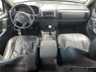 2004 Jeep Grand Cherokee Laredo z VIN 1J4GX48N94C386031, wystawiony jako Copart lot #55804755 z przebiegiem 160 103 mil mil oraz Szkoda całkowita • Salvage title. Historia ofert i sprzedaży dostępna na DreamBid. Obrazek 8.