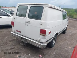 1993 GMC Vandura z VIN 1GTEG25K7PF510652, wystawiony jako IAAI lot #42097211 z przebiegiem 368 766 mil mil oraz . Historia ofert i sprzedaży dostępna na DreamBid. Obrazek 4.