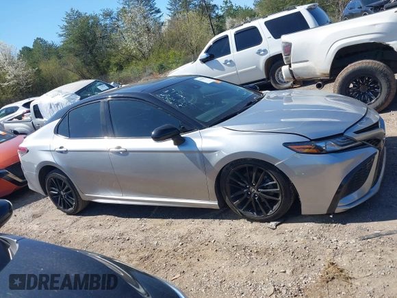 2022 Toyota Camry TRD with VIN 4T1KZ1AK8NU061810, listed as a IAAI auction lot 41769584 with 79,709 mi miles and . Bid and sale history available at DreamBid. Image 13.