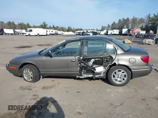 2000 Saturn SL z VIN 1G8ZK5275YZ244530, wystawiony jako IAAI lot #41784896 z przebiegiem 50 332 mil mil oraz . Historia ofert i sprzedaży dostępna na DreamBid. Obrazek 15.
