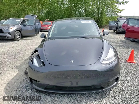 2024 Tesla Model Y Long Range z VIN 7SAYGDEE8RF986258, wystawiony jako Copart lot #58434275 z przebiegiem 59 934 mil mil oraz Szkoda całkowita • Salvage title. Historia ofert i sprzedaży dostępna na DreamBid. Obrazek 15.