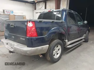 2003 Ford Explorer Sport Trac XLS z VIN 1FMDU77E03UC07089, wystawiony jako IAAI lot #41938966 z przebiegiem 128 982 mil mil oraz . Historia ofert i sprzedaży dostępna na DreamBid. Obrazek 4.