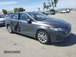 2020 Ford Fusion SE z VIN 3FA6P0LU0LR190090, wystawiony jako Copart lot #54791445 z przebiegiem 166 563 mil mil oraz Szkoda całkowita • Salvage title. Historia ofert i sprzedaży dostępna na DreamBid. Obrazek 4.