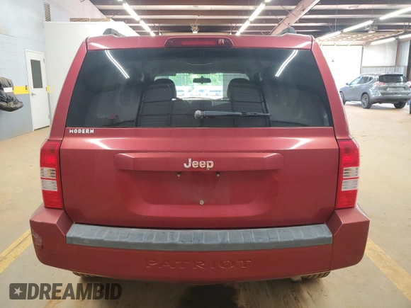 2007 Jeep Patriot Sport with VIN 1J8FT28W67D358205, listed as a Copart auction lot 52323215 with 133,212 mi miles and Salvage Title. Bid and sale history available at DreamBid. Image 6.