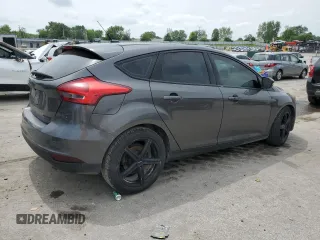2015 Ford Focus Titanium z VIN 1FADP3N2XFL357224, wystawiony jako Copart lot #55626575 z przebiegiem 159 422 mil mil oraz Szkoda całkowita • Salvage title. Historia ofert i sprzedaży dostępna na DreamBid. Obrazek 3.