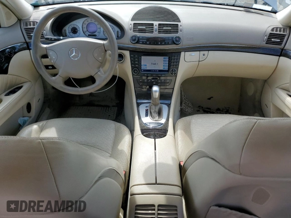 2004 Mercedes-Benz E-Class 5.0L with VIN WDBUF70J54A496963, listed as a Copart auction lot 64214634 with 113,575 mi miles and Salvage Title. Bid and sale history available at carsss.com. Image 8.