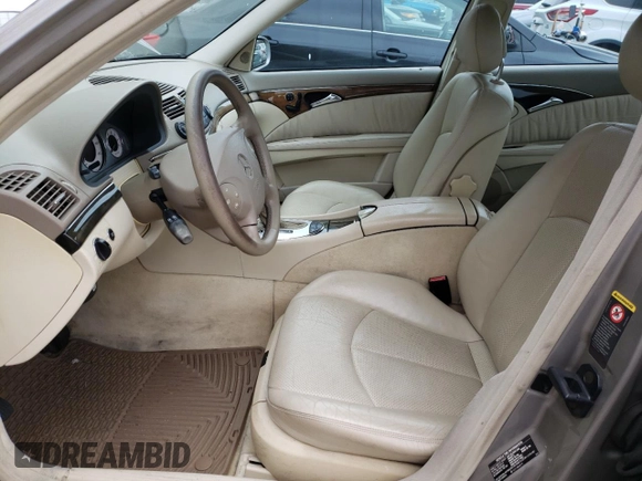 2003 Mercedes-Benz E-Class 3.2L with VIN WDBUF65J93A148116, listed as a Copart auction lot 49144604 with 128,837 mi miles and Clean Title. Bid and sale history available at carsss.com. Image 7.