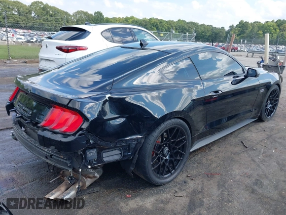 2021 Ford Mustang GT with VIN 1FA6P8CF0M5149169, listed as a IAAI auction lot 40151328 with 22,295 mi miles. Bid and sale history available at carsss.com. Image 4.