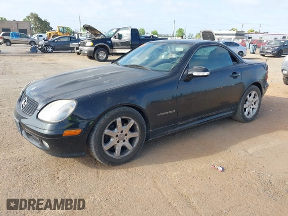 2003 Mercedes-Benz SLK-Class 2.3L with VIN WDBKK49F33F273872, listed as a IAAI auction lot 42111682 with 143,969 mi miles. Bid and sale history available at carsss.com. Image 2.