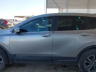 2020 Honda CR-V EX-L z VIN 2HKRW2H8XLH687314, wystawiony jako IAAI lot #41955562 z przebiegiem 54 336 mil mil oraz . Historia ofert i sprzedaży dostępna na DreamBid. Obrazek 14.