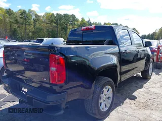 2021 Chevrolet Colorado 2WD LT with VIN 1GCGSCEN4M1100584, listed as a IAAI auction lot 40625359 with 42,766 mi miles and . Bid and sale history available at DreamBid. Image 4.