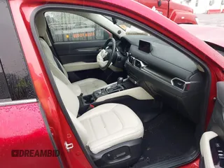 2019 Mazda CX-5 Grand Touring with VIN JM3KFBDM8K0693622, listed as a IAAI auction lot 42503818 with 60,812 mi miles and . Bid and sale history available at DreamBid. Image 5.