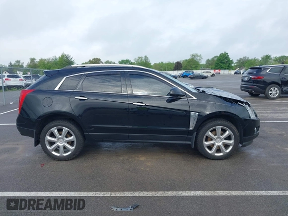 2015 Cadillac SRX Performance Collection with VIN 3GYFNCE3XFS638994, listed as a IAAI auction lot 42243558 with 141,704 mi miles and . Bid and sale history available at DreamBid. Image 13.