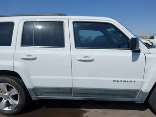 2011 Jeep Patriot Latitude with VIN 1J4NT1GB5BD245263, listed as a IAAI auction lot 41942376 with 215,147 mi miles. Bid and sale history available at carsss.com. Image 13.