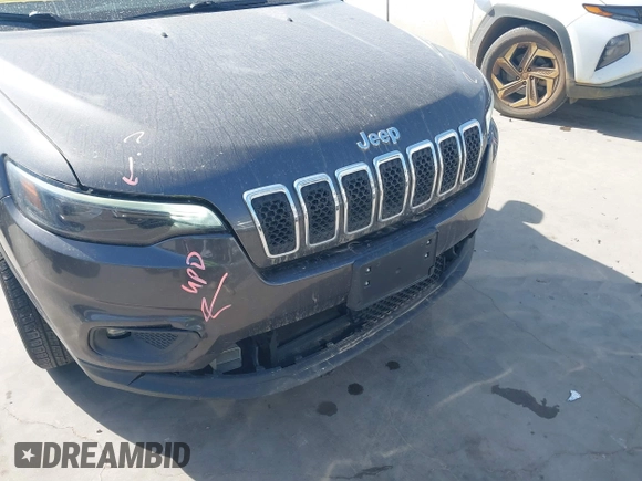 2019 Jeep Cherokee Latitude Plus with VIN 1C4PJLLB0KD382309, listed as a IAAI auction lot 41812968 with 144,368 mi miles. Bid and sale history available at carsss.com. Image 6.