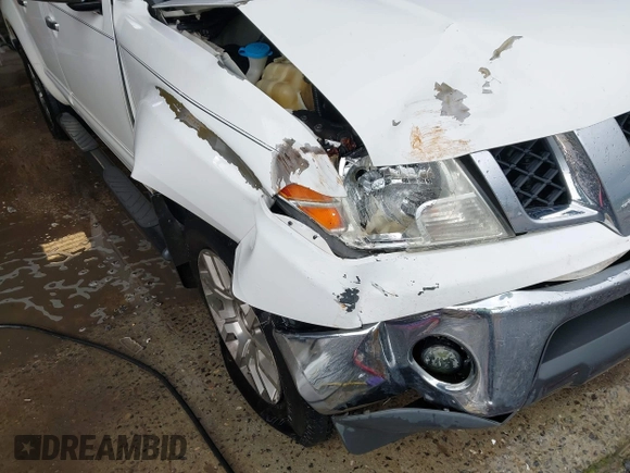 2011 Nissan Frontier Pro-4X with VIN 1N6AD0EV3BC409184, listed as a IAAI auction lot 42122823 with 209,669 mi miles and . Bid and sale history available at DreamBid. Image 6.