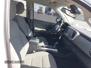 2020 Toyota Tacoma SR5 with VIN 3TMCZ5AN5LM339977, listed as a IAAI auction lot 41886937 with 94,986 mi miles and . Bid and sale history available at DreamBid. Image 5.