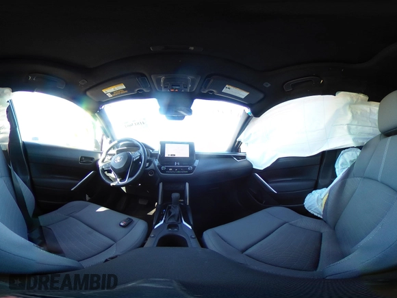 2023 Toyota Corolla Cross Hybrid S with VIN 7MUFBABG6PV008234, listed as a IAAI auction lot 41813661 with 1,127 mi miles and . Bid and sale history available at DreamBid. Image 18.