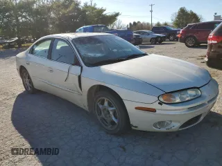 2002 Oldsmobile Aurora z VIN 1G3GS64C624124303, wystawiony jako Copart lot #78372624 z przebiegiem Nie podano mil oraz Szkody całkowita. Historia ofert i sprzedaży dostępna na DreamBid. Obrazek 4.