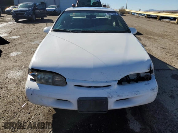 1994 Ford Thunderbird LX with VIN 1FALP62WXRH217279, listed as a Copart auction lot 80512504 with 176,798 mi miles and Salvage Title. Bid and sale history available at DreamBid. Image 5.