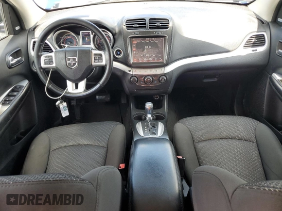 2012 Dodge Journey SXT with VIN 3C4PDCBG8CT231640, listed as a Copart auction lot 60625465 with 131,358 mi miles and Salvage title. Bid and sale history available at DreamBid. Image 8.