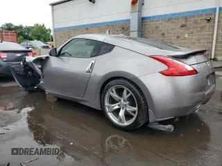 2009 Nissan 370Z Touring with VIN JN1AZ44E69M404789, listed as a Copart auction lot 62015094 with 56,447 mi miles and Salvage Title. Bid and sale history available at carsss.com. Image 2.