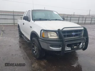 1997 Ford F-150 XL with VIN 1FTDX1863VNB01474, listed as a IAAI auction lot 41446672 with 223,296 mi miles. Bid and sale history available at carsss.com. Image 1.