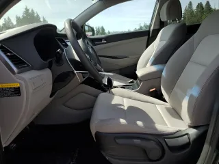 2017 Hyundai Tucson SE z VIN KM8J23A4XHU396438, wystawiony jako Copart lot #59636915 z przebiegiem 36 493 mil mil oraz Szkoda całkowita • Salvage title. Historia ofert i sprzedaży dostępna na DreamBid. Obrazek 7.