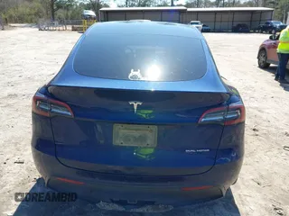 2021 Tesla Model Y Long Range with VIN 5YJYGAEE1MF207948, listed as a IAAI auction lot 41779570 with 100,859 mi miles. Bid and sale history available at carsss.com. Image 16.