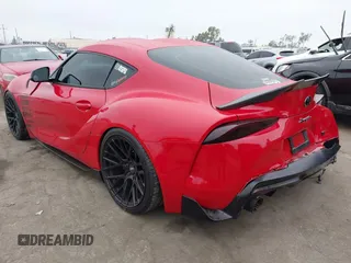 2023 Toyota Supra 3.0 with VIN WZ1DB0G04PW058168, listed as a IAAI auction lot 42383816 with 22,135 mi miles and . Bid and sale history available at DreamBid. Image 3.