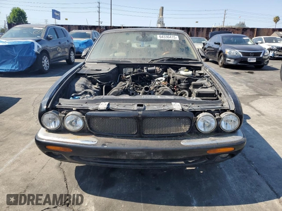 2003 Jaguar XJ with VIN SAJDA15B63MF52618, listed as a Copart auction lot 64336415 with Not provided miles and Clean title. Bid and sale history available at DreamBid. Image 5.