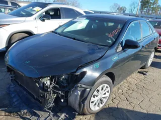 2015 Toyota Camry Hybrid LE with VIN 4T1BD1FK7FU167027, listed as a IAAI auction lot 41697235 with 253,152 mi miles. Bid and sale history available at carsss.com. Image 17.