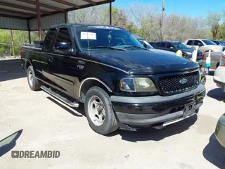 1999 Ford F-150 with VIN 1FTZX1728XKB68094, listed as a IAAI auction lot 41863108 with 219,109 mi miles and . Bid and sale history available at DreamBid. Image 1.