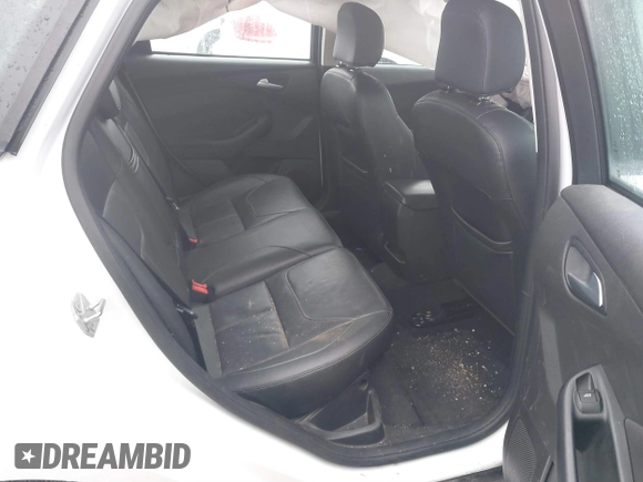 2016 Ford Focus SE z VIN 1FADP3F27GL326593, wystawiony jako IAAI lot #41024761 z przebiegiem 131 200 mil mil oraz . Historia ofert i sprzedaży dostępna na DreamBid. Obrazek 8.