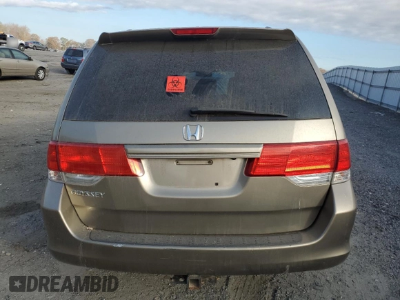 2009 Honda Odyssey EX-L with VIN 5FNRL38649B413532, listed as a Copart auction lot 79867014 with 308,701 mi miles and Salvage Title. Bid and sale history available at DreamBid. Image 6.