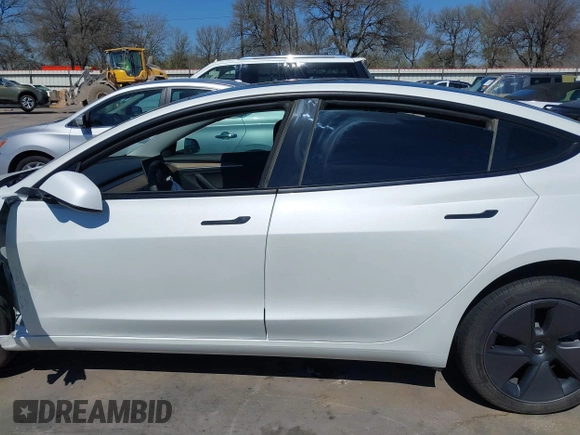 2023 Tesla Model 3 z VIN 5YJ3E1EA0PF608506, wystawiony jako IAAI lot #41748862 z przebiegiem 15 mil mil oraz . Historia ofert i sprzedaży dostępna na DreamBid. Obrazek 14.
