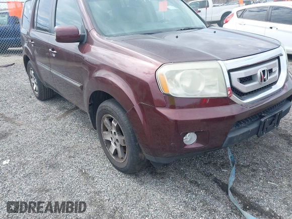 2010 Honda Pilot Touring with VIN 5FNYF4H95AB040721, listed as a IAAI auction lot 41928412 with 213,219 mi miles and . Bid and sale history available at carsss.com. Image 6.