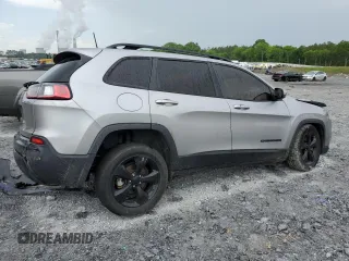 2021 Jeep Cherokee Latitude Plus with VIN 1C4PJLLB8MD112568, listed as a Copart auction lot 53832485 with 128,186 mi miles and Salvage title. Bid and sale history available at DreamBid. Image 3.