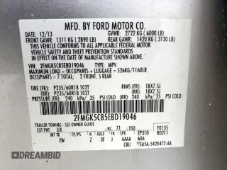 2014 Ford Flex SEL z VIN 2FMGK5C85EBD19046, wystawiony jako Copart lot #55405415 z przebiegiem 105 796 mil mil oraz Szkody całkowita. Historia ofert i sprzedaży dostępna na DreamBid. Obrazek 13.