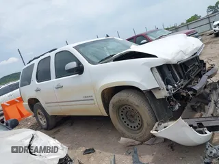 2012 Chevrolet Tahoe LTZ with VIN 1GNSCCE00CR197950, listed as a IAAI auction lot 42393693 with 296,161 mi miles and . Bid and sale history available at DreamBid. Image 13.
